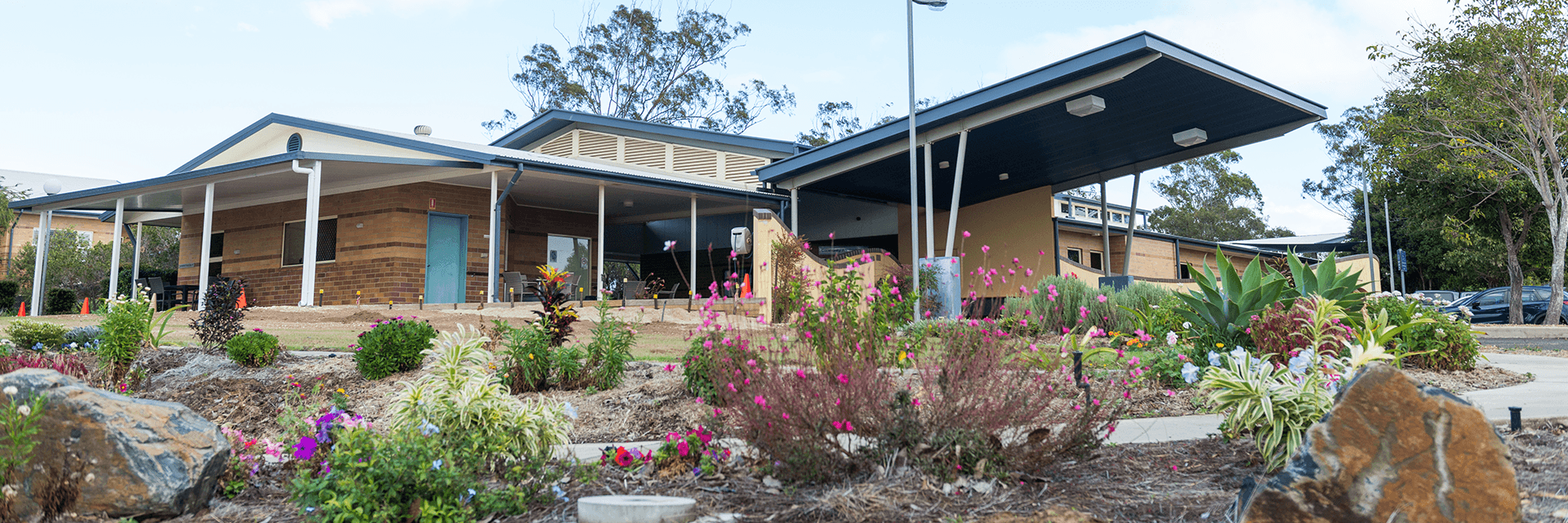 A splash of colour greets visitors to Blue Care Gladstone Edenvale Aged Care Facility Pretty, colourful flowers adorn the garden beds on the approach to Blue Care Gladstone Edenvale Aged Care Facility.