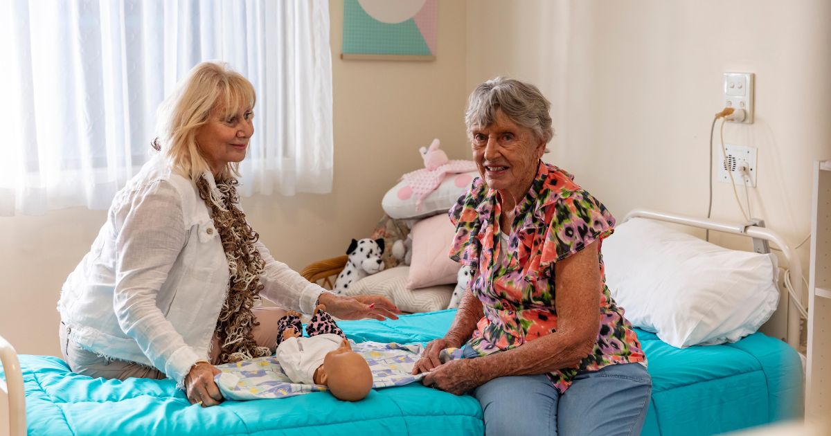 Women with dementia caring for baby